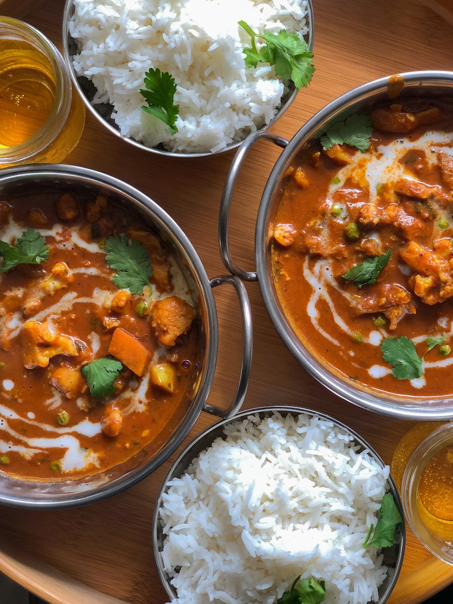 A rich curry finished with cream in a copper handi